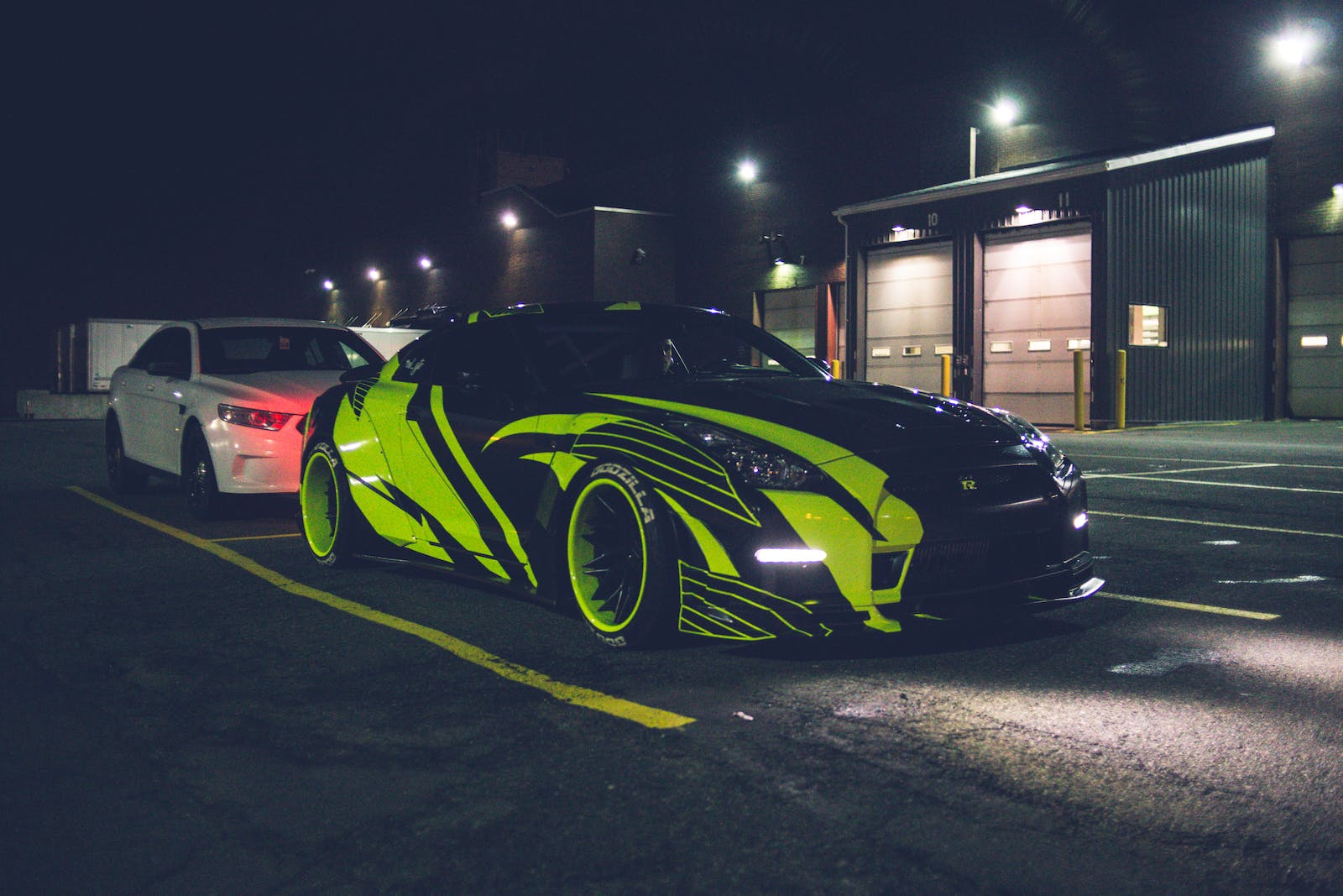 black car with some green vinyl work